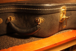 Opening guitar case when transporting in cold